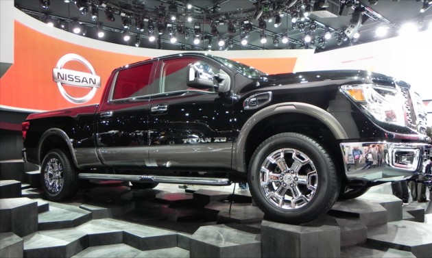 Nissan Titan XD black - side 1