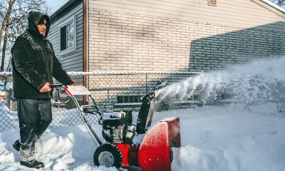 Man using snow blower