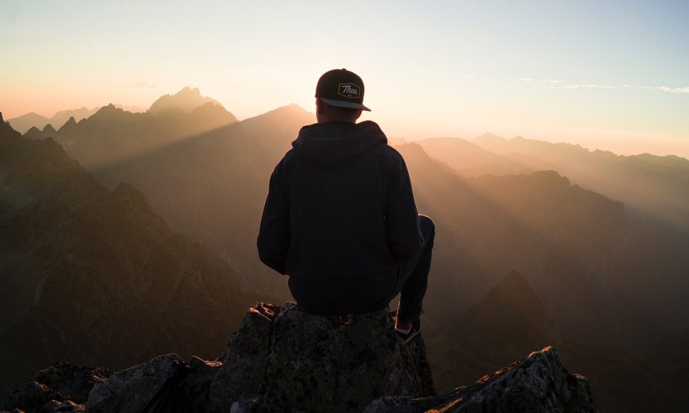 Man sitting on mountain