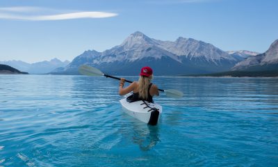 Girl kayaking on a lake