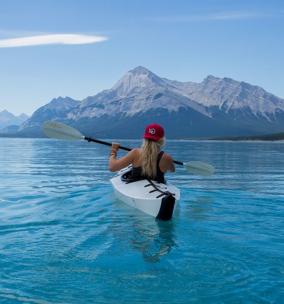 Girl kayaking on a lake
