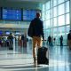 Man Walking Through Airport