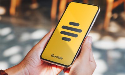 Woman using Bumble on phone