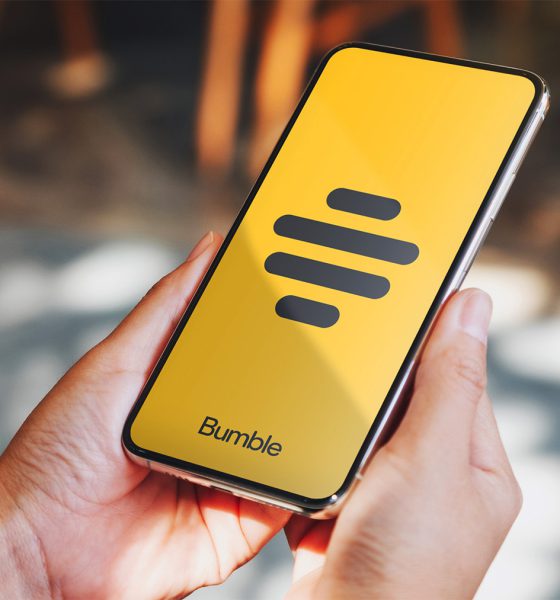 Woman using Bumble on phone