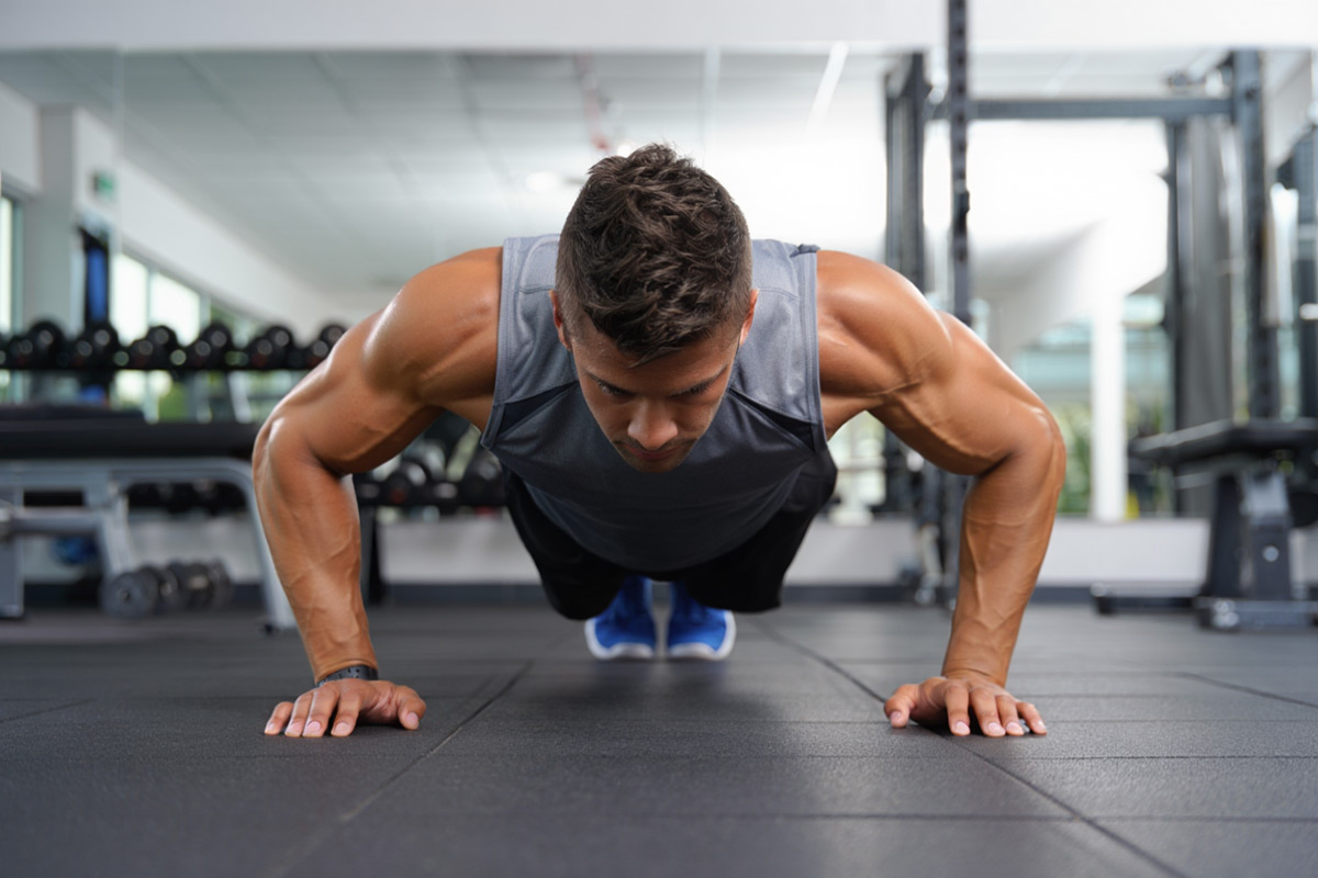 Man doing push-ups in gym